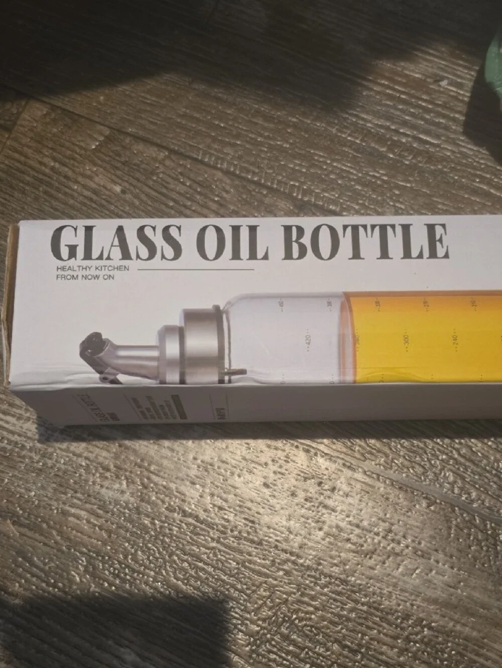 Glass Oil Bottle - Clear Glass with Silver Top